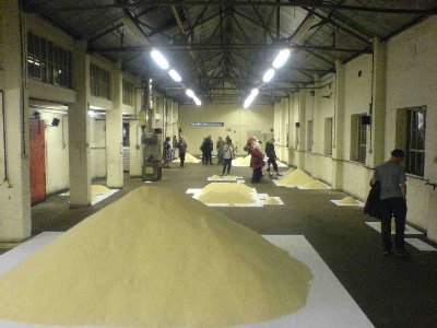 Rice piled up in a disused factory in Hockley Birmingham UK
